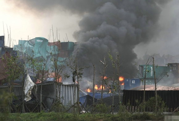 天津特大爆炸事现场堪比战争后 为天津祈福